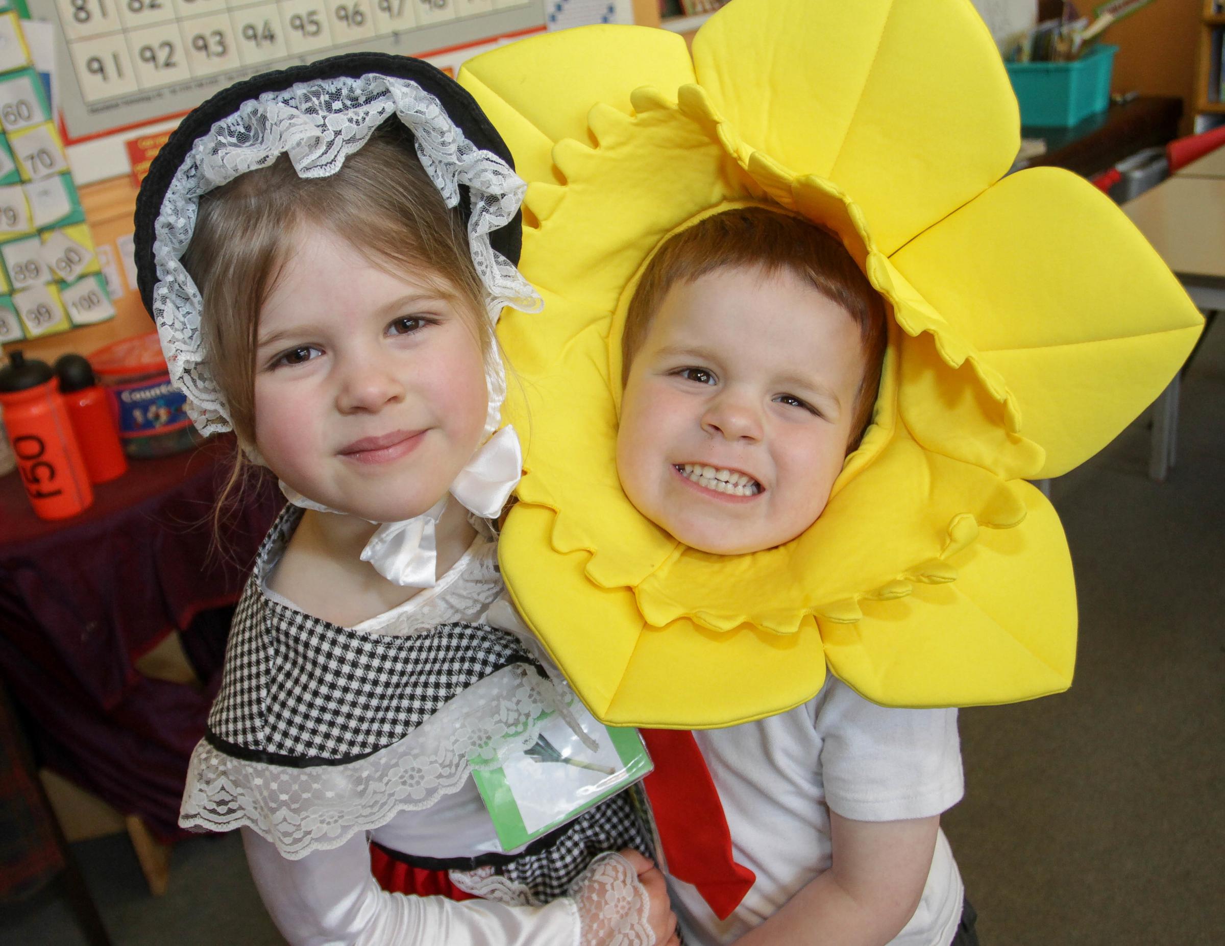Pupils from Buttington and Trewern Primary School celebrated St Davids Day last Thursday (13-03-2014) and held their school Eisteddfod. Pic is. Tommy Kaye (4) and Ruby Pryce (5). RD101_2014-5