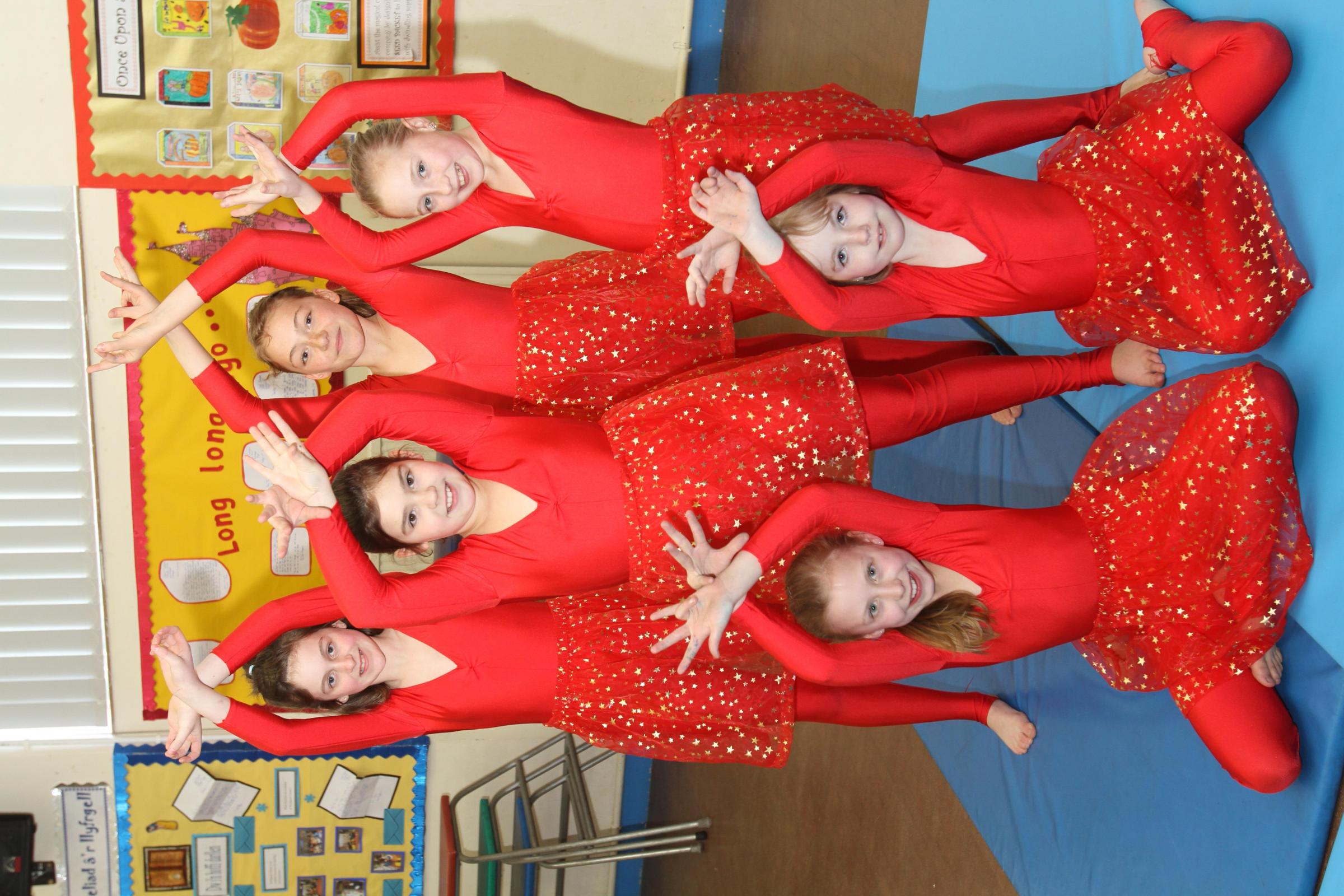 Maesydre Primary School St Davids Day School Eisteddfodpic are the winners of the Disco Dance competitionback l-r Nicole Edwards , Sophie Evans , Neve Spencer-Moller and Ffion Johnsfront l-r Chloe Williams and Molly Robinson. PB118-2012