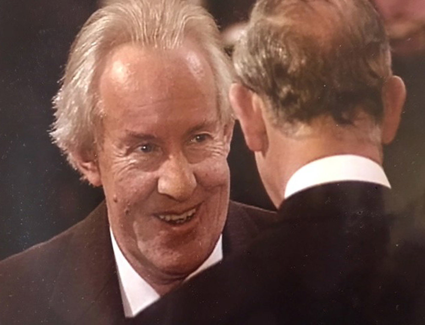 Julian Burrell was awarded an OBE from Prince Charles in 2006.