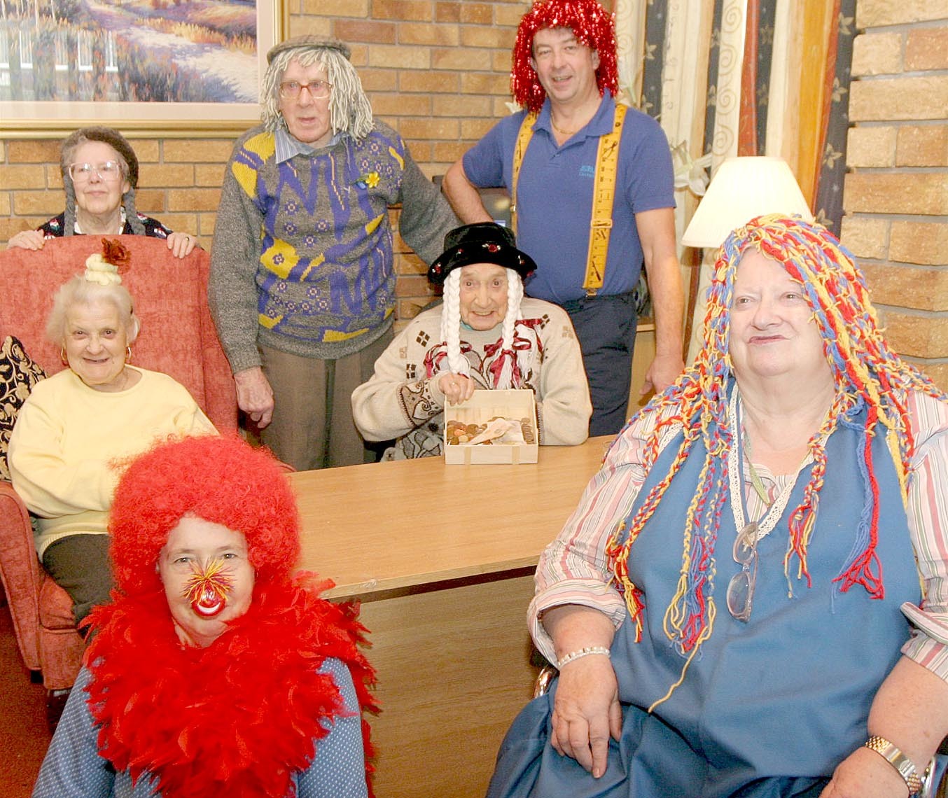 Plas Cae Crwn Residential Home, Newtown Pic (back) Doris Edwards, Ada Adams, Colwyn Howells, Alice Bayliss and Clive Burd. (front) Carol Davies (care assistant), Mary-Jo. The residents hand made wigs and then took to the streets to ask for donations to