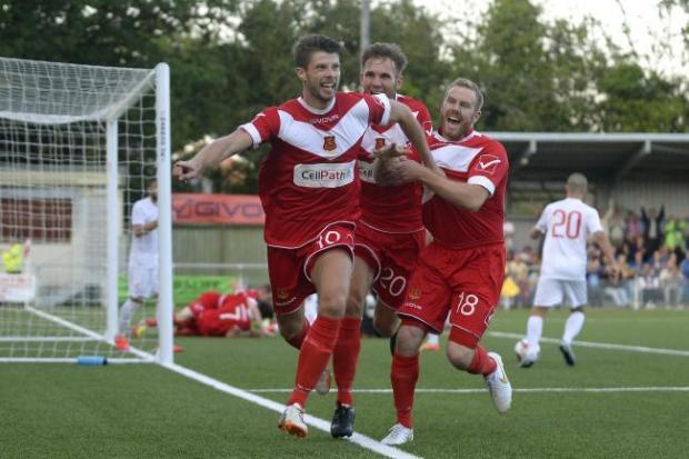 County Times: Jason Oswell celebrates his late winner against Valletta. 