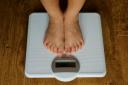 File photo dated 15/7/2014 of a person on scales. The number of counselling sessions for young children about eating and body image disorders in the past year has risen, a charity said. Issue date: Friday August 13, 2021..