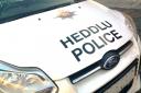 The incident involved an overturned Dyfed Powys Police vehicle, the force confirmed.