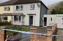The house in Borfa Green, Welshpool, was cordened off by police
