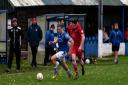 Action from Llandrindod Wells' draw with Llanrhaeadr. Picture by Darren Laurie.