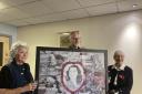 Builth mayor Mark Hammond with the picture of Violette Szabo. Her daughter Tania was also present along with Cllr Alison Lewis