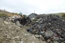 Illegal waste dumped on land at Wemyss Mine .