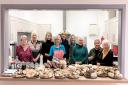 Pictured are members of the Builth Cancer Research committee ready to serve the lunch after the preparations in the Strand Hall kitchen.