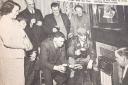 A lovely picture of locals surrounding the gas fire in the Red Lion in Caersws in the 1950s.