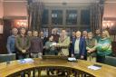 Llanidloes Town Council present a cheque for £2,000 to Llanidloes Youth Club secretary Cllr Kelly Hawkins.