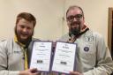 Edward Parsons and Matthew McManus with their awards for 10 years of Scouting service.