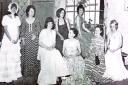 Members of Newtown Amateur Dramatics Society in Laura Ashley dresses in 1974.