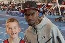 Jayden was given his medal by Sir Mo Farah