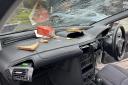 The vehicle's windscreen was smashed and coke was poured over the electrics.