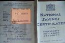 Allan Higgs' National Savings books.