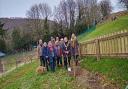 Knighton mayor, Chris Branford, with a volunteer group at the community garden