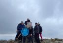 Gemma Bradford, Karon Duggan, Anna Jones, Carl Watkins, Martin Stevens, Beth James and Sarah Griffiths at the summit of Cadair Idris