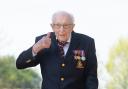 File photo dated 16/04/2020 of the then 99-year-old war veteran Captain Tom Moore at his home in Marston Moretaine, Bedfordshire, after he achieved his goal of 100 laps of his garden.