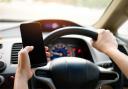 Court spares builder using mobile driving ban as 