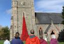 The poppy waterfall took over 60 hours to assemble and erect at the church. Picture by phil Blagg Photography.