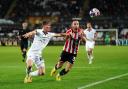Sheffield United's Rhys Norrington-Davies (right) and Swansea City's Fin Stevens battle for the ball during the Sky Bet Championship match at the Swansea.com Stadium, Swansea. Picture date: Tuesday September 13, 2022.