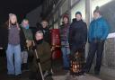 Royal Mail postal workers in Welshpool brave the -5° temperatures this morning as they start a two day strike today and Thursday 15th December 2022, pictured are some of the workers keeping warm outside Welshpool delivery office.Picture by Phil Blagg