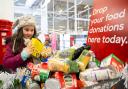 Tesco's four Powys stores have seen over 50,000 meals donated since December