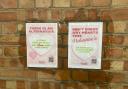 Climate activists take part in guerrilla poster campaign round Newtown