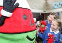 St Mary's Catholic Primary School, Newtown had a visit from Mr Urdd in September 2018. Pictured from left are Maja Jackowsca and Isla Mark with Mr Urdd.