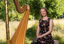 Alis Huws with the Royal harp.