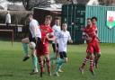 Action from Llanidloes Town's clash at Chirk AAA. Picture by Brian Prydden.