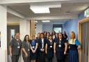 The Dyfi Valley Health team, with Dr Bradbury-Willis back right, are pictured in their new home.
