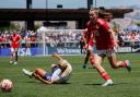 Carrie Jones in action for Wales against USA.