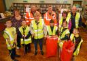 Members of the Builth Wells Scout Group pictured with Trish Thomas (Builth Wells Library), Cllr Bryan Davies, Ashley Collins (PCC waste and recycling senior manager), Sharon Walters (PCC waste and recycling team) and Cllr Jeremy Pugh