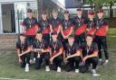 Newtown Cricket Club Under 18s line up with the silverware.