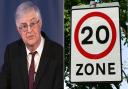 First Minister Mark Drakeford and a 20mph sign.