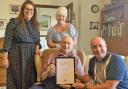 Tom Evans finally received his Points of Light award from Steve Hughson, watched by MP Fay Jones and his daughter Amanda Thomas, earlier this year.