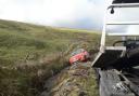 Car being recovered from the ditch on Forge Road, near Machynlleth.