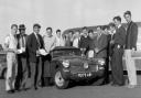 Welshpool & District Motor Club gathered around an Austin Healey Sprite in 1964. Picture by Don Griffiths.