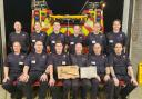 Steve Amor (bottom row, third r) pictured with crew members at Station 15 in Llanwrtyd.