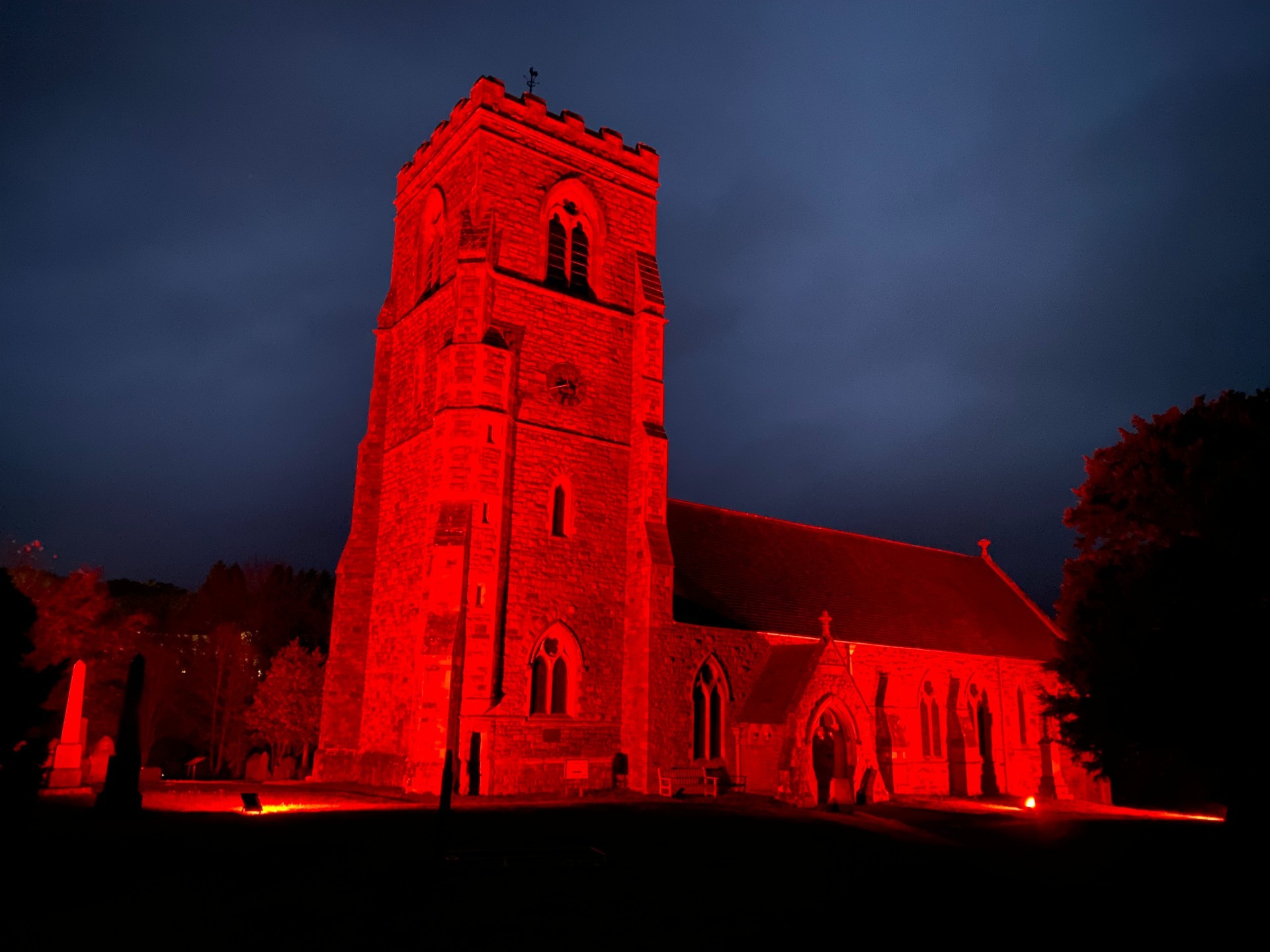 St Marys Church in Llanfair Caereinion was lit up in red as part of the tradional Remembrance traditions. Picture by Anwen Parry/County Times
