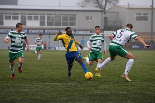 Action from TNS' victory at Barry Town United. Picture by Brian Jones.