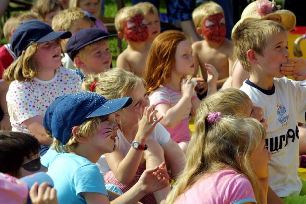 OSWESTRY SHOW 3RD AUGUST 2002 Children at the show are entertained by the Panic Circus' Punch and Judy show.