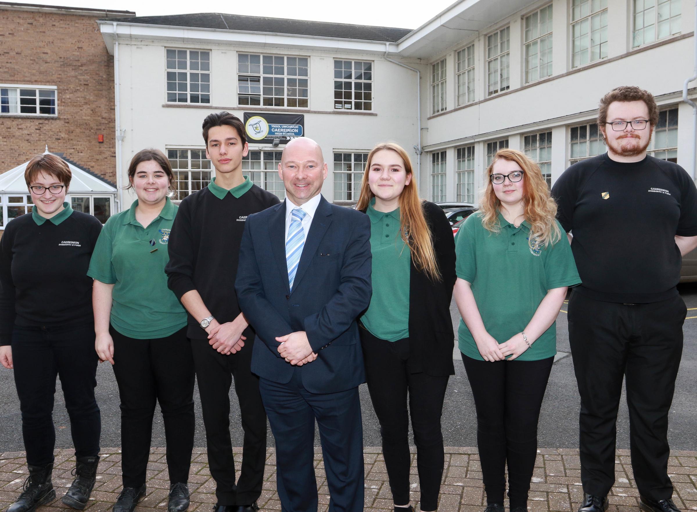 Caereinion High School new head teacher Mr Phil Jones..Pictured from left to right, Isobell Arrowsmith, Frances Andew, Dylan Bridgen (Head Boy) Phil Jones (Head Teacher) Agatha Titley (Head Girl) Laura Bebb and Ieuan Lowther..Pictured by Phil