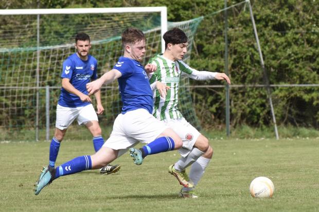 Action from Carno v Caersws on Saturday. Picture by Tim Evans.