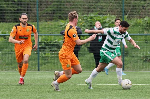 Louis Robles in action for TNS against Caernarfon Town. Picture by Brian Jones.