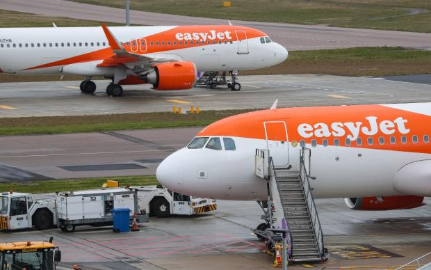 County Times: Two easyJet planes at an airport (PA)