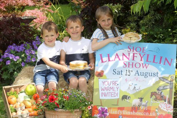 Getting their entries ready for the show are Jac, Iwan and Cerys Davies from Llanfyllin