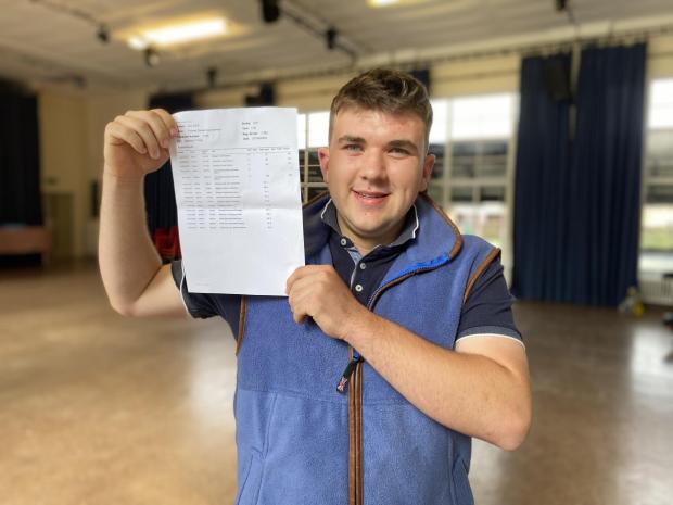 County Times: Thomas Jerman, 18, from Trefeglwys will studying Rural Enterprise and Land Management at Harper Adams after achieving two A*s and two As in A-level results at Llanidloes High School on August 18, 2022. Picture by Anwen Parry/County Times.