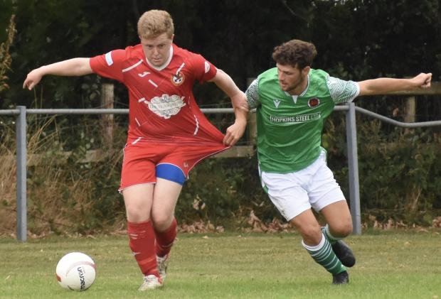 County Times: Action from Rhayader Town's victory at Carno.  Photo by Tim Evans.
